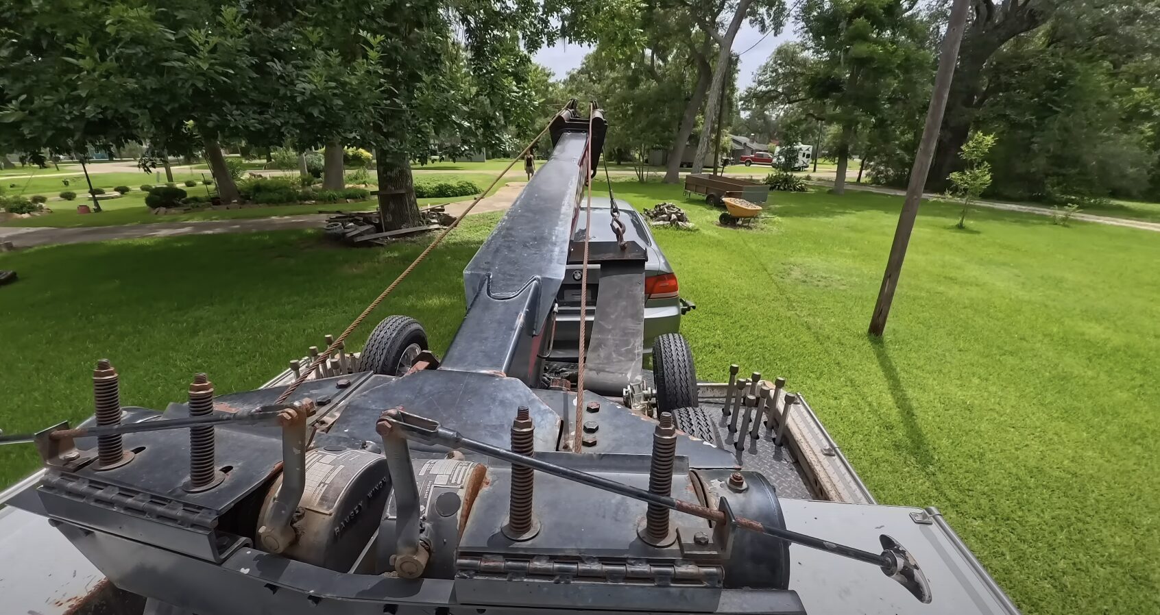 Tow truck equipment and machinery for safe vehicle recovery