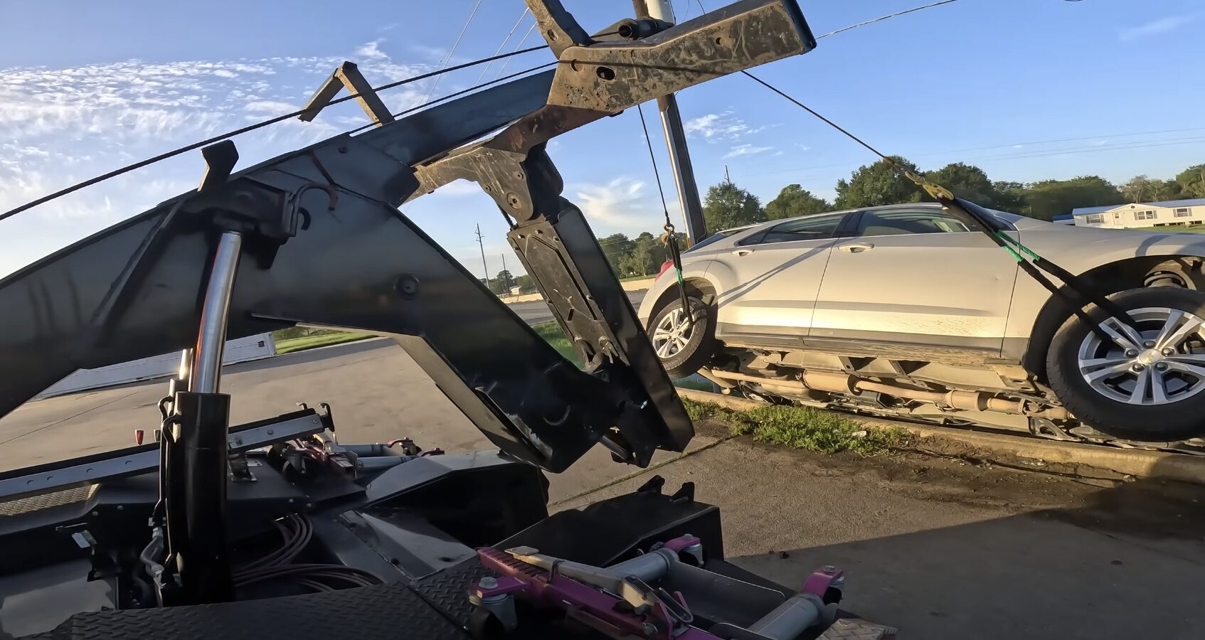 Expert flatbed towing services for luxury and classic cars Professional flatbed tow truck safely loading luxury vehicle