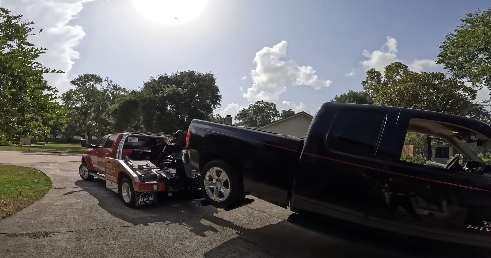 Heavy-duty towing truck handling large vehicle recovery